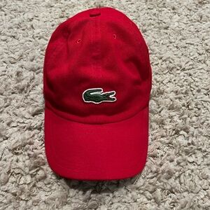 Lacoste  Cap with adjustable velcro back.